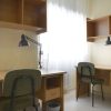 Studium Living - habitación doble mesas de estudio